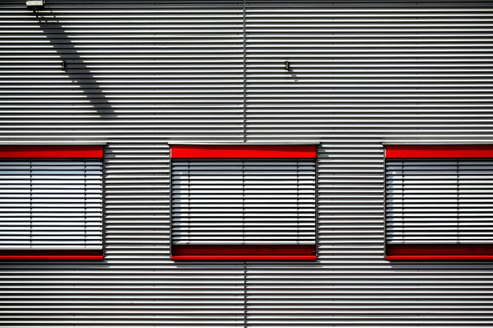 Red Windows Striped Facade by Hans-Wolfgang Hawerkamp — canvas wall art