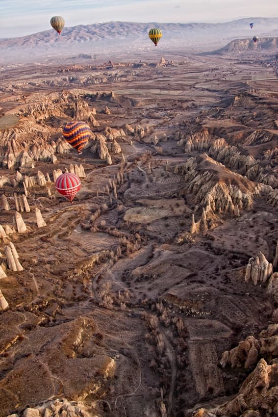 Hot Air Balloon Valleys by Alain Mazalrey — canvas wall art