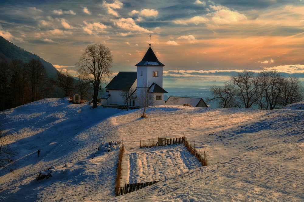 Snowy Church Golden Hour by Drago Vogrinec — canvas wall art