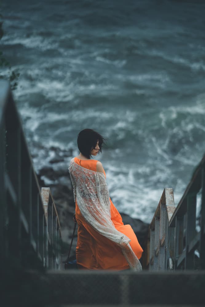 Pensive Woman Ocean View by HIDASAN — canvas wall art