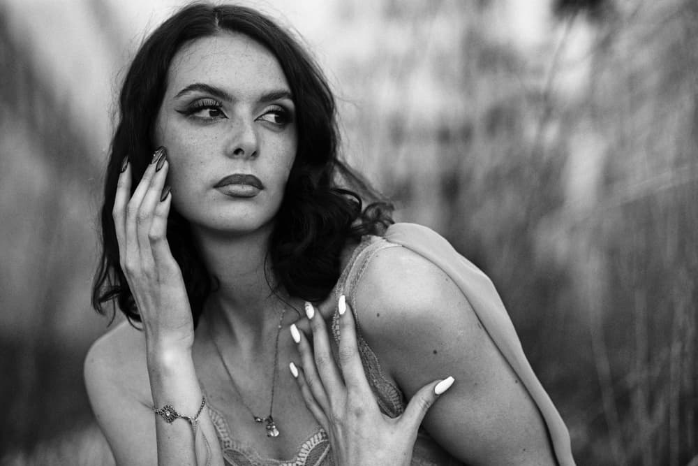 Elegant Woman Pensive Gaze by Josefina Melo — canvas wall art