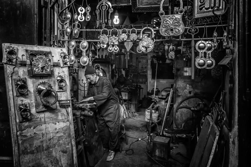 Traditional Craftsman Working by Pavol Stranak — canvas wall art