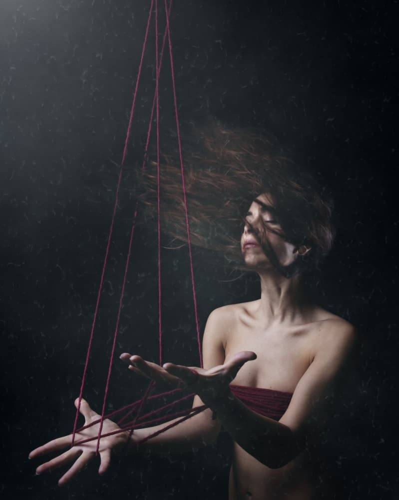 Bound by Red Strings by claudia méndez cordero — canvas wall art