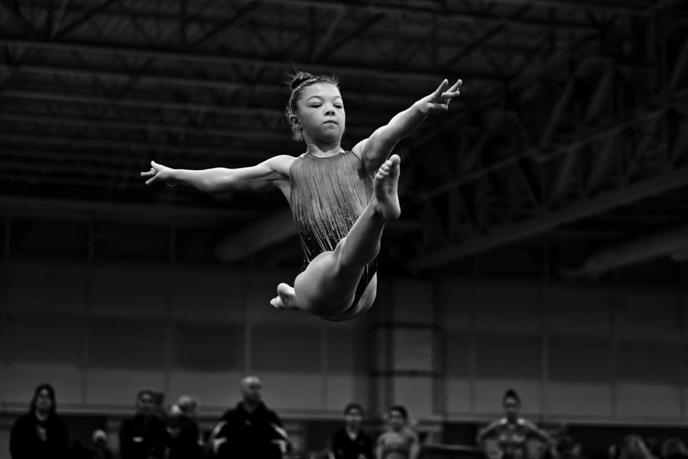 Dynamic Gymnast Leap by Rob Li — canvas wall art