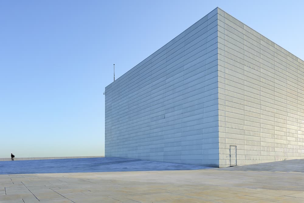 Solitary Figure Modern Building by Wayne Pearson — canvas wall art