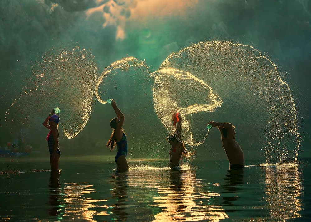 Golden Hour Water Play by Gilcan Mete — canvas wall art