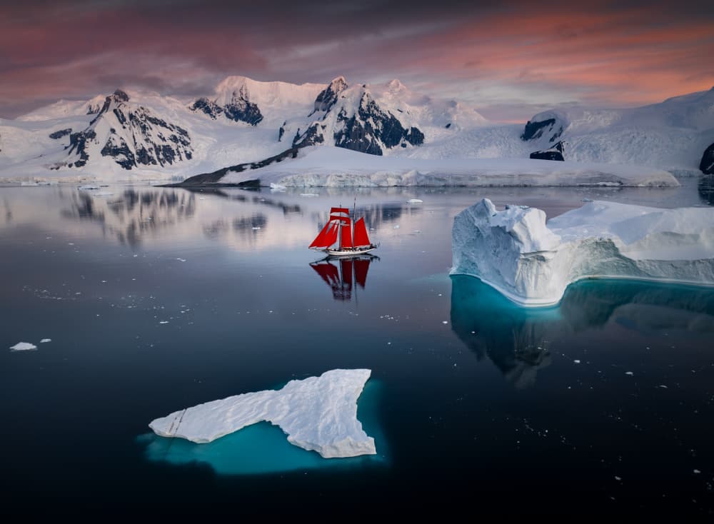 Antarctic Red Sail Adventure by Karol Nienartowicz — canvas wall art