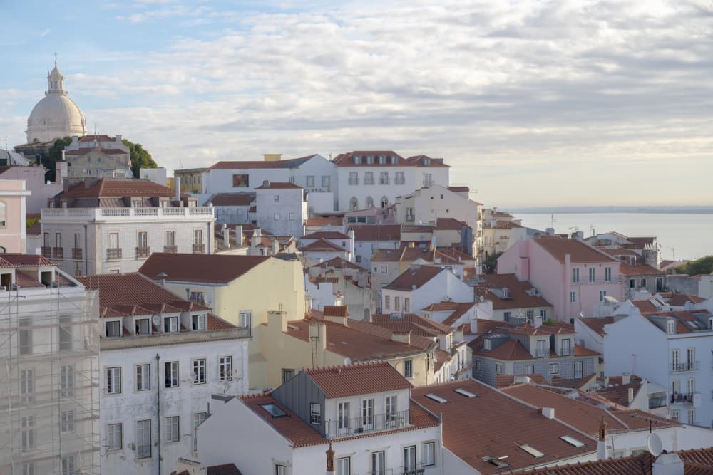 European City Rooftop Vista by Christa Stroo — canvas wall art