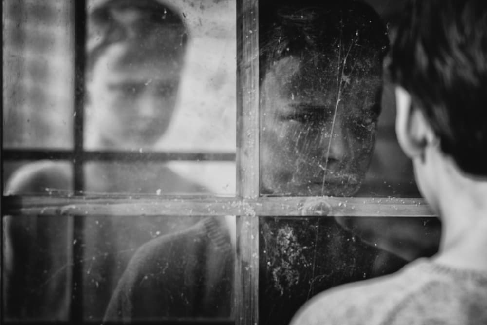 Young Boy's Reflection by Mirjam Delrue — canvas wall art