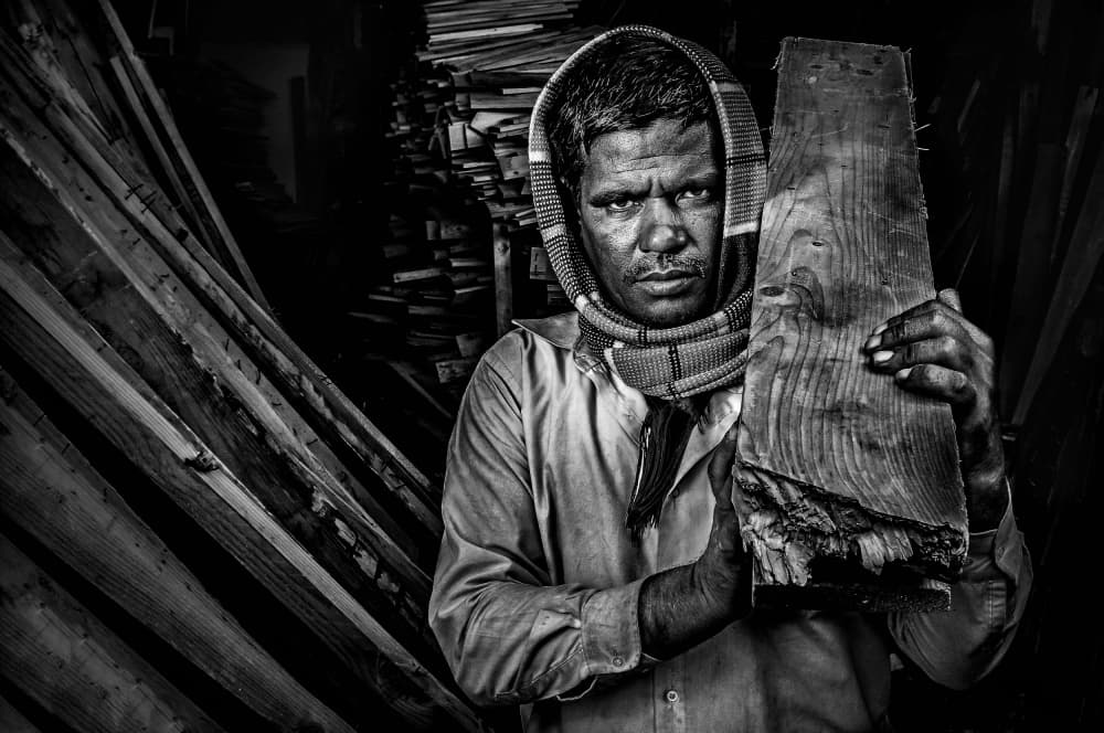 Intense Worker Portrait by Saeed Dhahi — canvas wall art