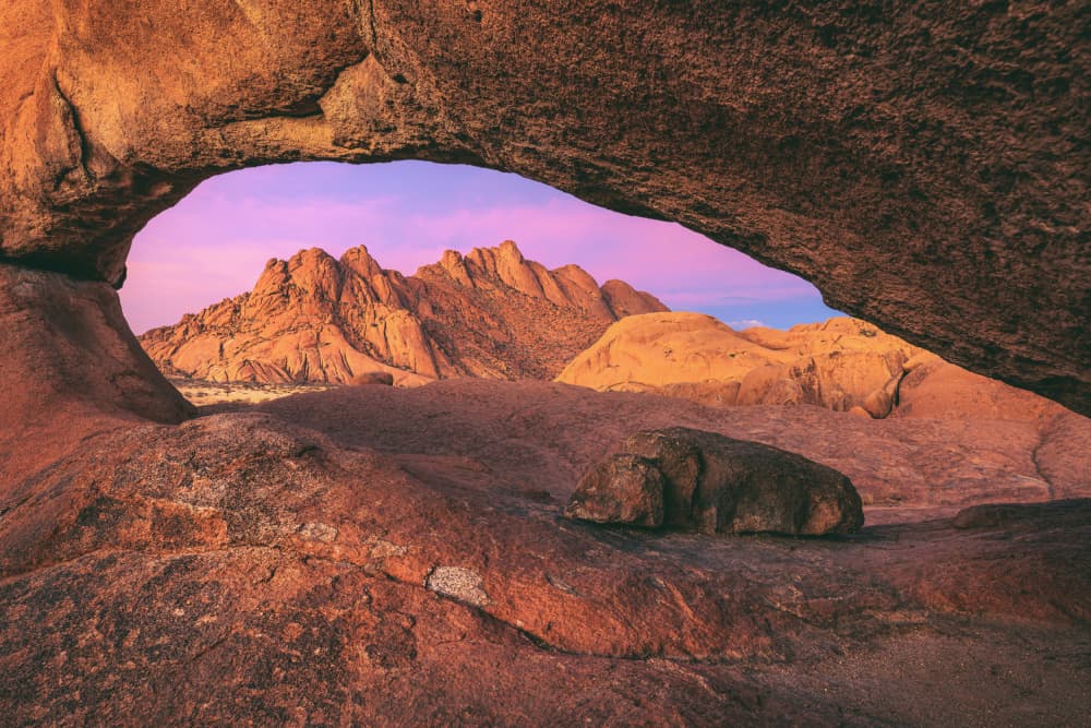 Desert Arch Pink Sky by Jean Claude Castor — canvas wall art