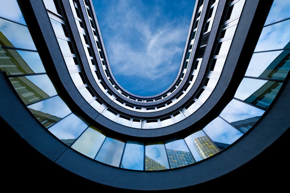 Curved Building Reflections by Rolf Endermann — canvas wall art