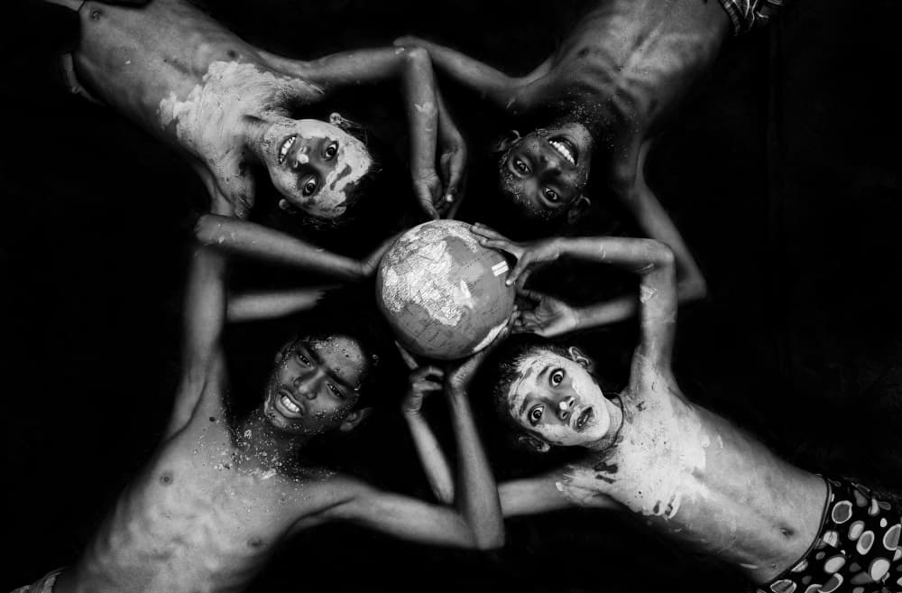 Boys Holding the World by Ajit Kumar Majhi — canvas wall art