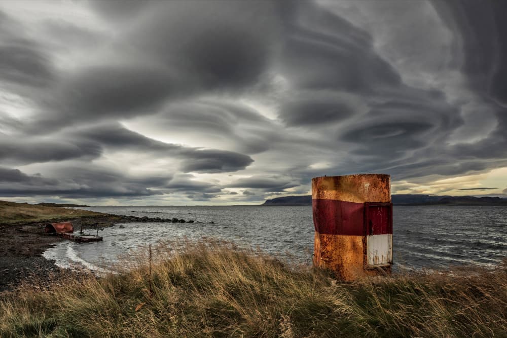 Rusty Barrel Stormy Sea by Bragi Ingibergsson - BRIN — canvas wall art