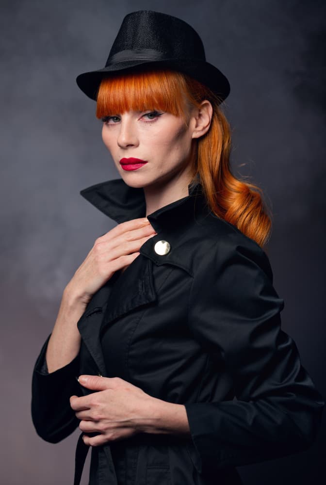 Redhead in Noir Trench by Offer Ellbogen — canvas wall art