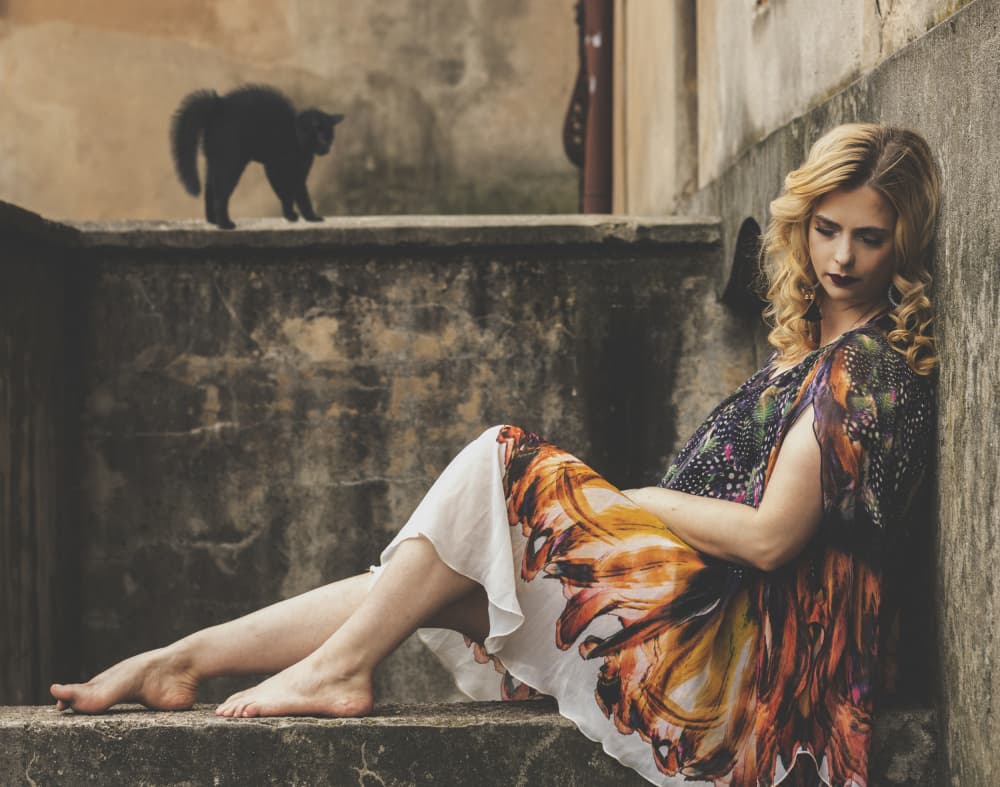 Pensive Woman and Cat by Ewa Całkosińska-Kajzer — canvas wall art