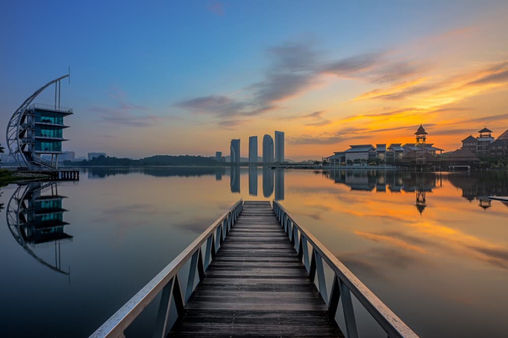 Reflective City Pier Sunset by Hafiz Ismail — canvas wall art