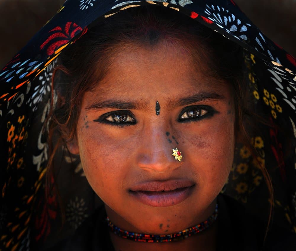 Young Indian Gaze by Lou Urlings — canvas wall art