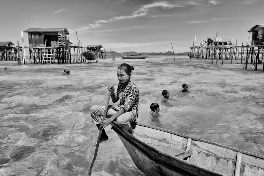 Village Boat Life by Kieron Long — canvas wall art
