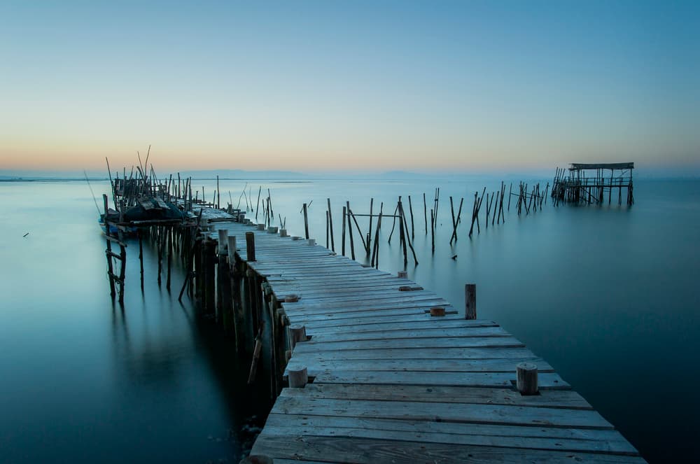 Tranquil Wooden Pier by Eugenio Pastor Benjumeda — canvas wall art