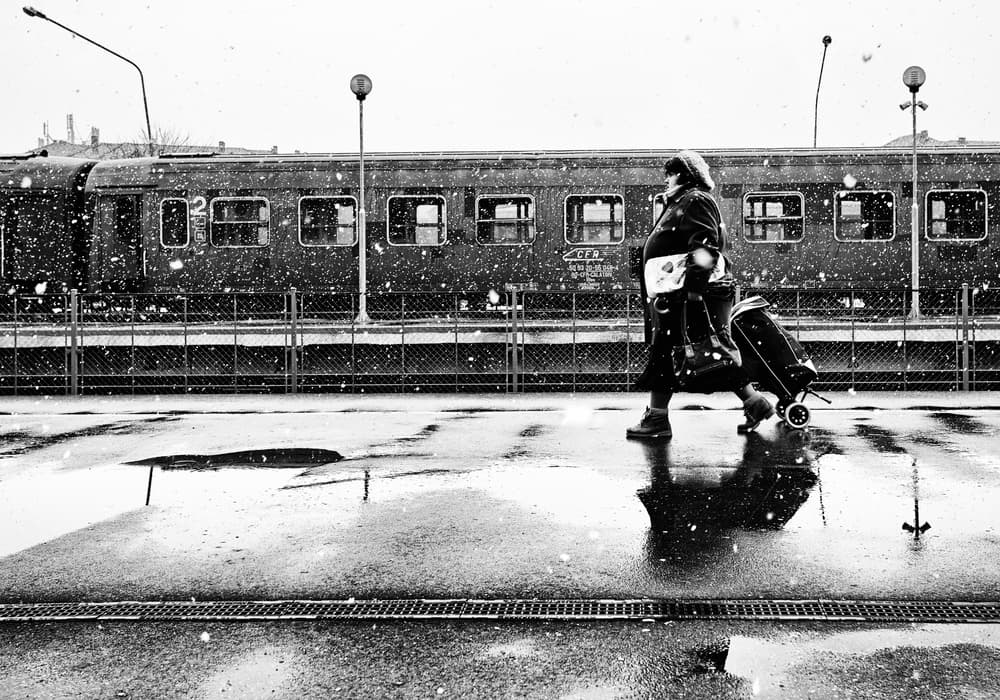 Snowy Train Station Walk by Julien Oncete — canvas wall art