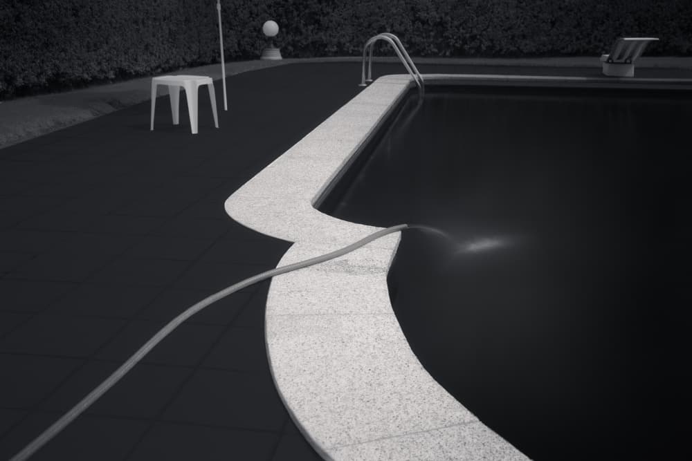 Hose Fills Dark Pool by Olavo Azevedo — canvas wall art