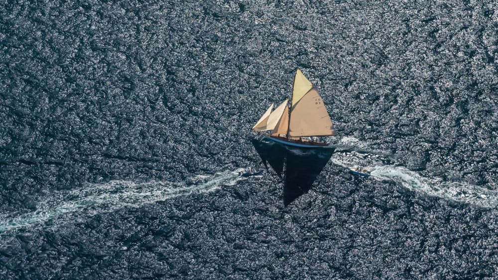 Lone Boat on Deep Waters by Marc Pelissier — canvas wall art