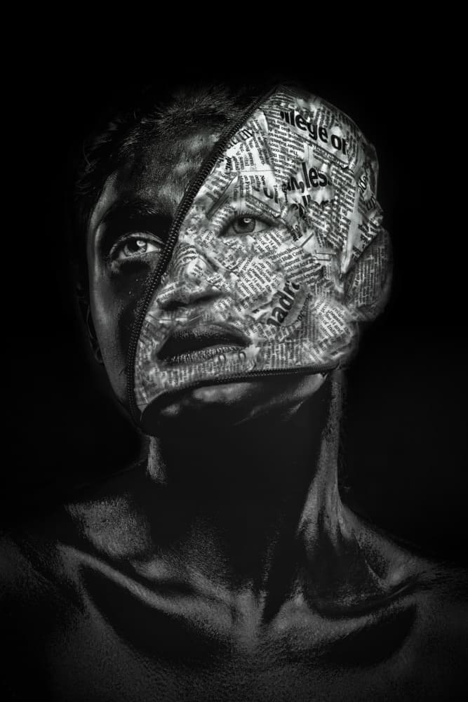 Unzipped Newspaper Face by PARTHA BHATTACHARYYA — canvas wall art