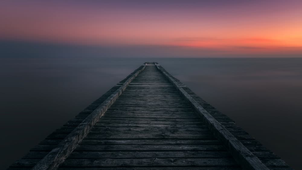 Peaceful Pier Sunset by Thomas de Franzoni — canvas wall art
