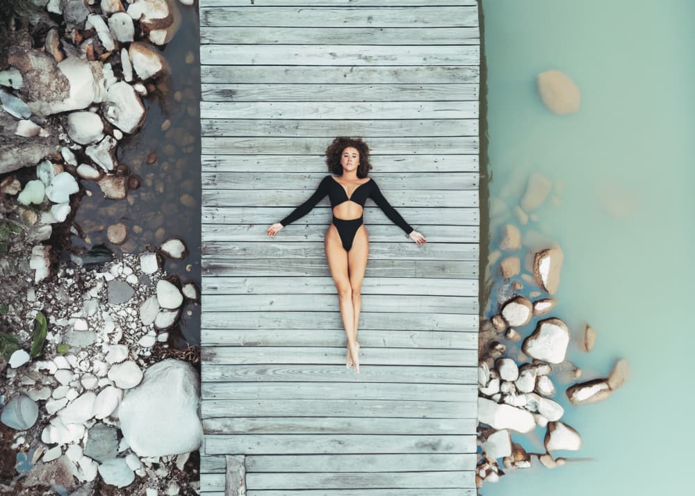 Serene Dock Woman by Tyler McAuley — canvas wall art