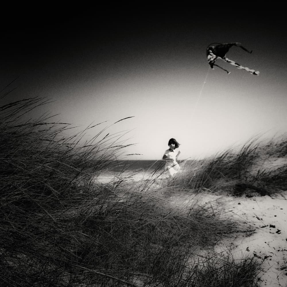 Girl And Flying Kite by Rui Correia — canvas wall art