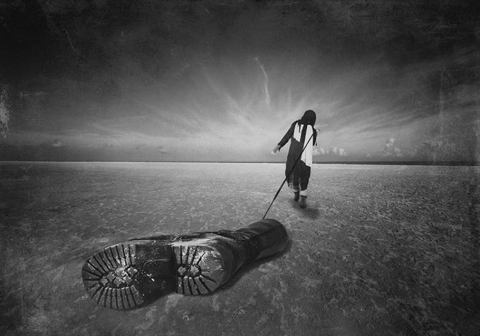 Lone Figure Heavy Burden by Moein Hasheminasab — canvas wall art