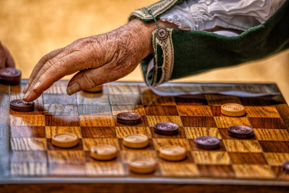 Strategic Checkers Move by Teri Reames — canvas wall art
