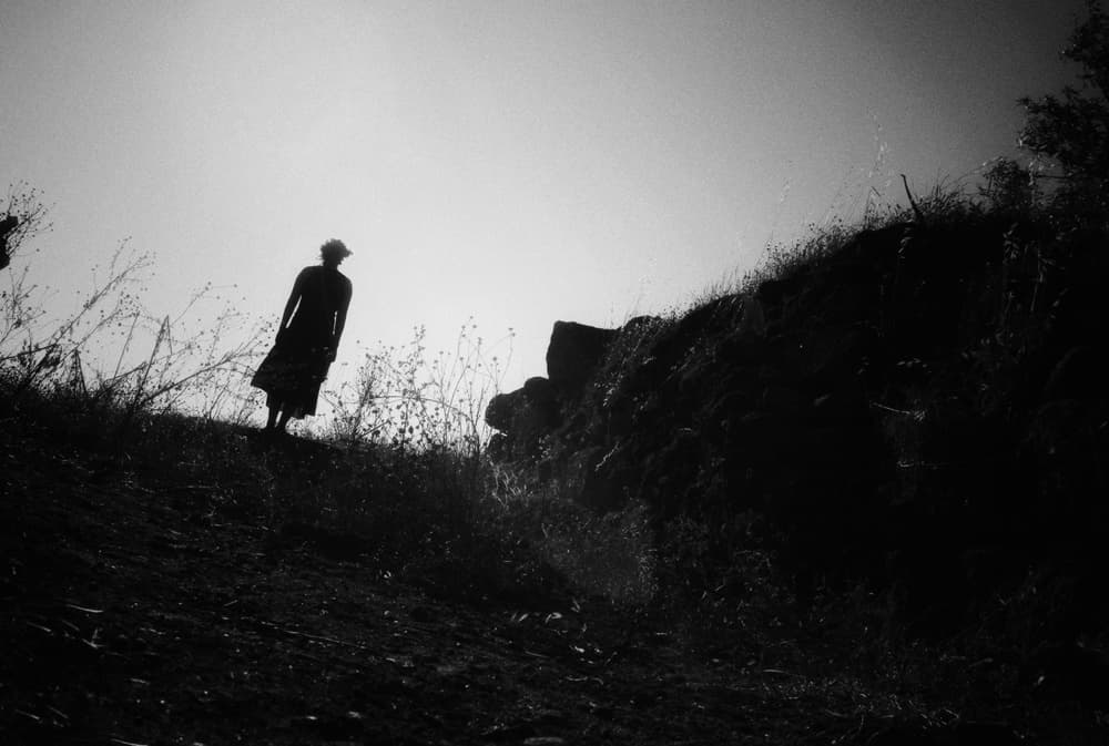 Solitary Hill Silhouette by Ali Ayer — canvas wall art