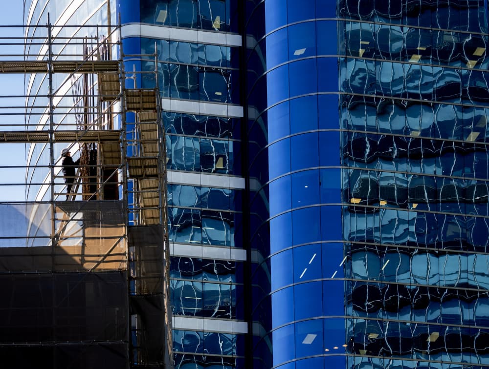 Blue Glass Building Construction by HAN dong hee — canvas wall art