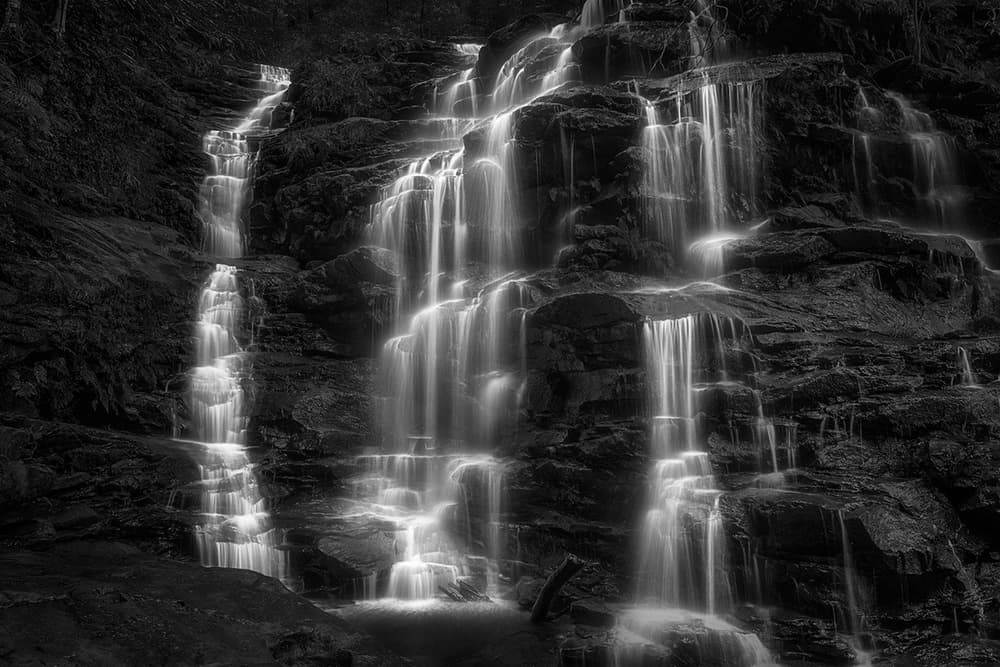 Flowing Forest Waterfall by Jingshu Zhu — canvas wall art