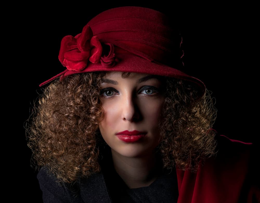 Elegant Woman Red Hat by Luc Stalmans — canvas wall art