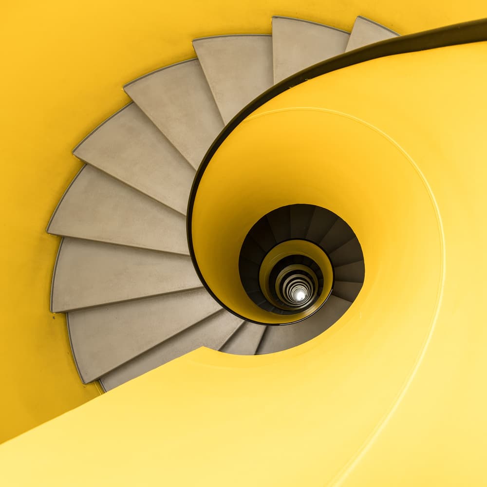 Yellow Spiral Staircase by Franco Tessarolo — canvas wall art