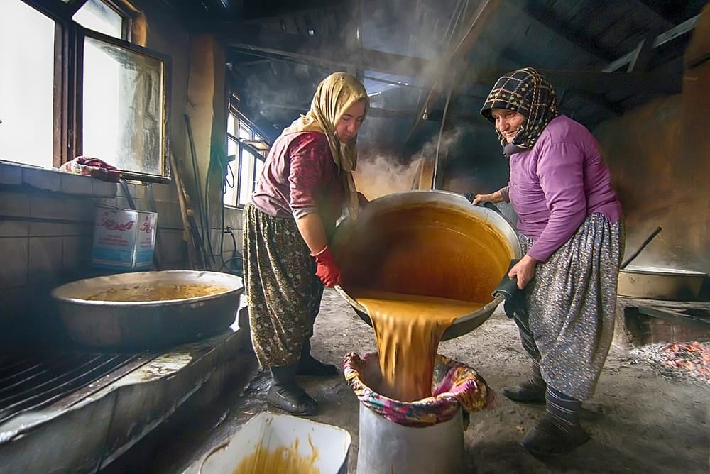 Women Making Sweet Syrup by Emine Basa — canvas wall art