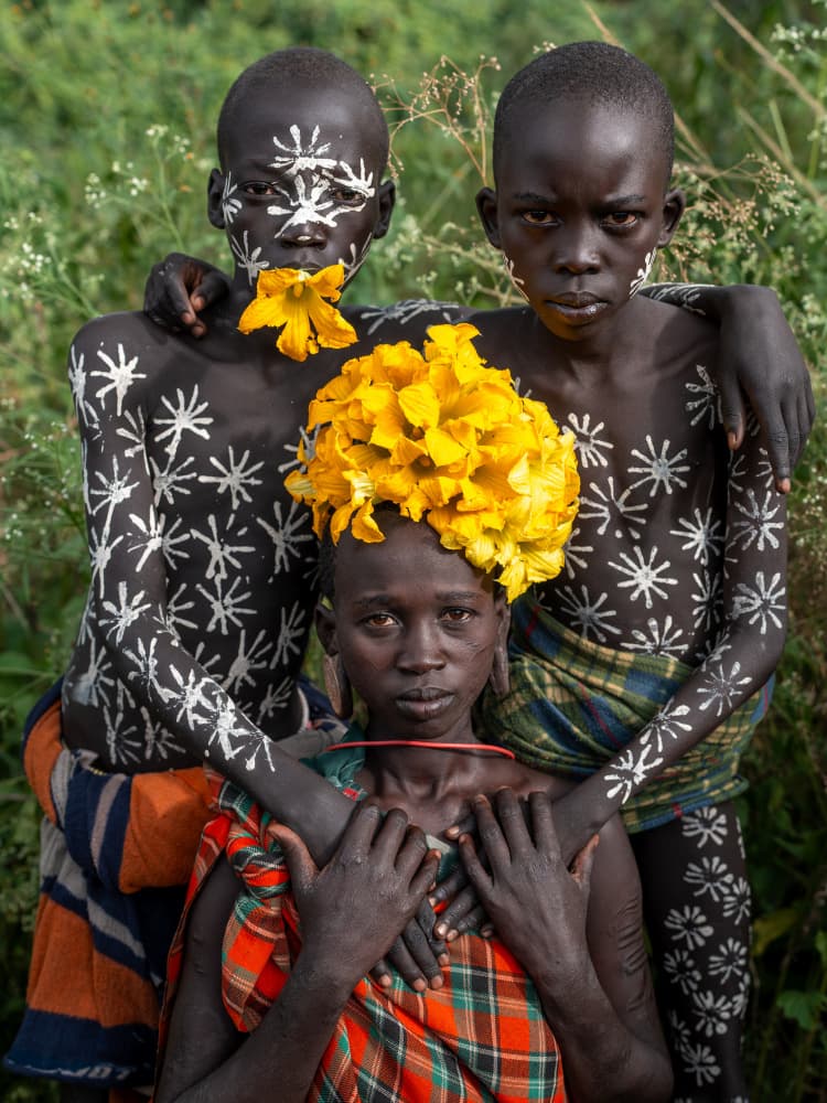 Tribal Youth With Flowers by HuongHoang — canvas wall art