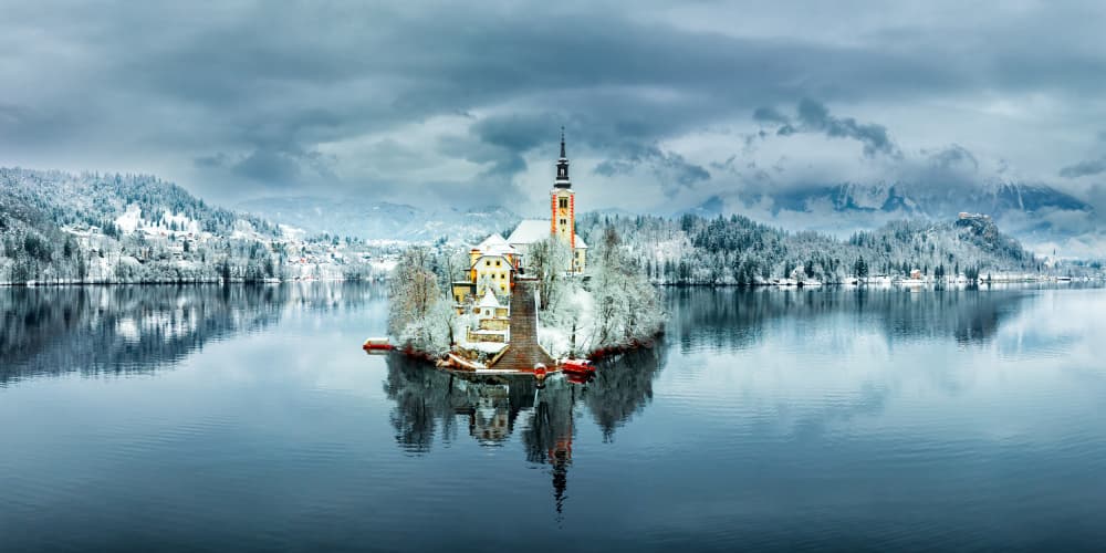 Majestic Winter Island Church by James Bian — canvas wall art