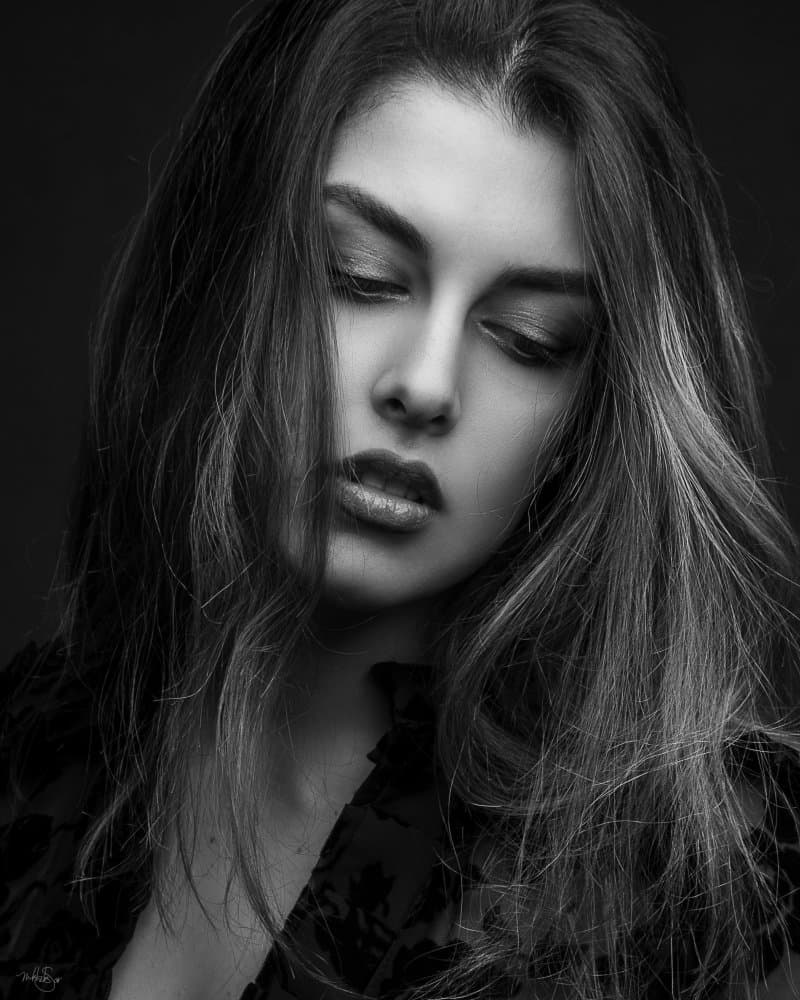 Pensive Woman Portrait by Khaksar — canvas wall art