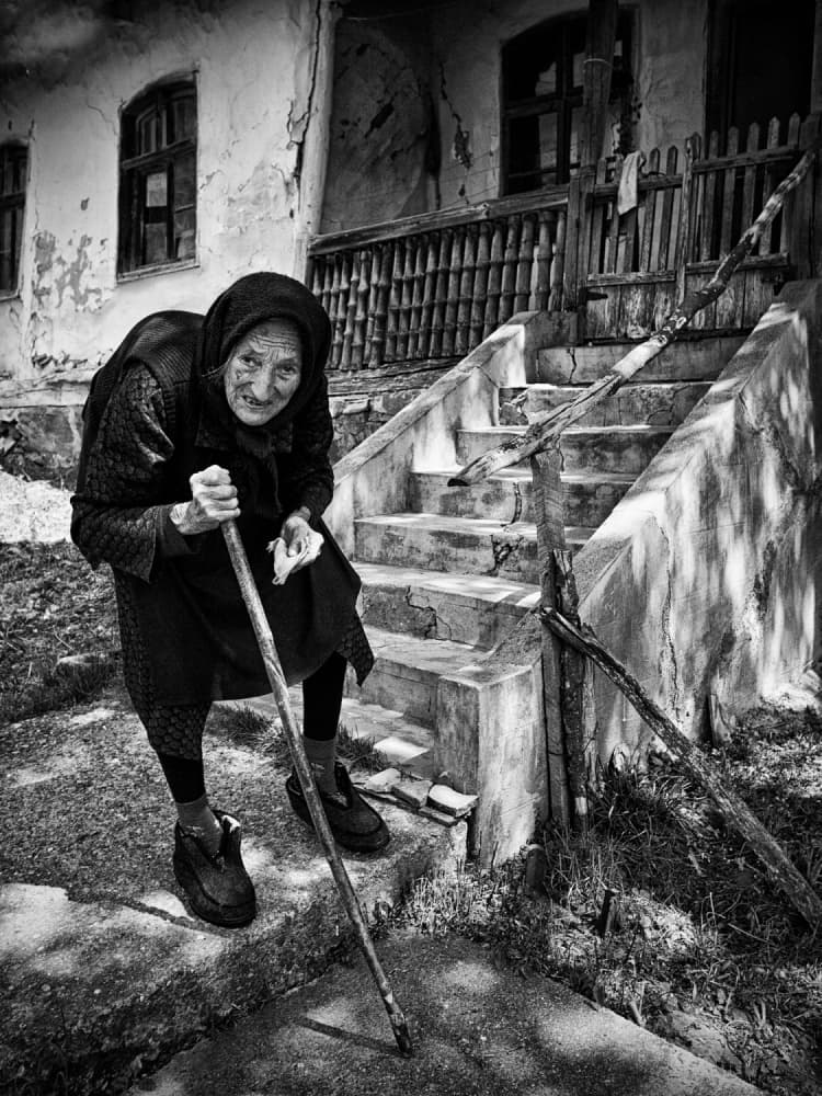 Aged Woman Old House by Zoran Toldi (EFIAP AZSF) — canvas wall art