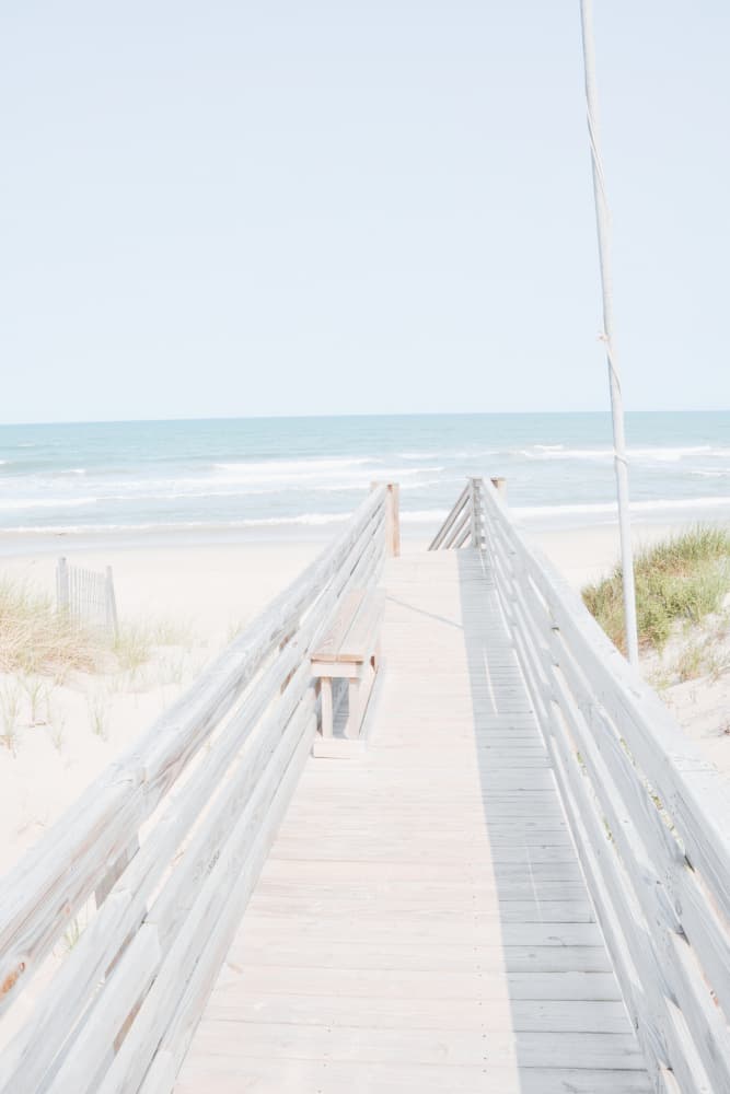 Serene Beach Boardwalk by Jemma Morris — canvas wall art
