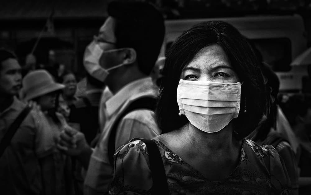 Masked Woman in Crowd by Peter Davidson — canvas wall art