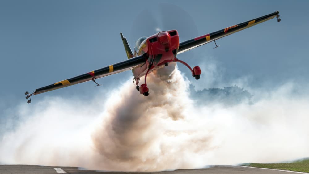 Acrobatic Plane Smoke Burst by Piotr Wrobel — canvas wall art