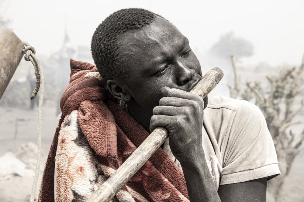 Pensive Man With Stick by Elena Molina — canvas wall art