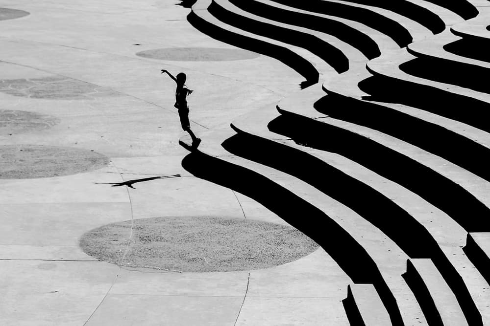 Child on Geometric Steps by Emine Basa — canvas wall art