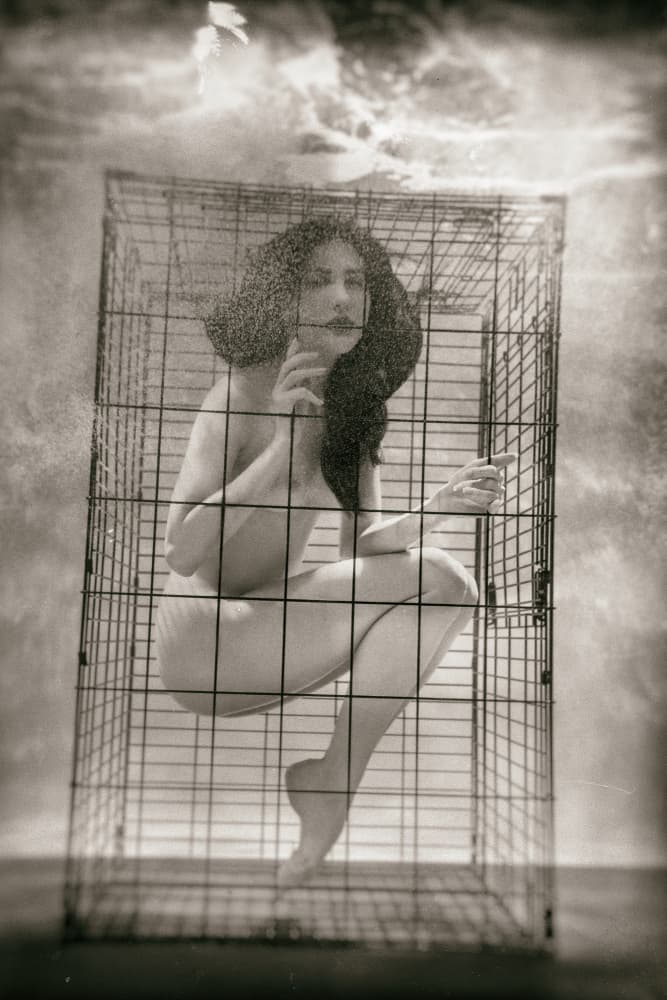 Caged Woman Underwater by Zanna — canvas wall art