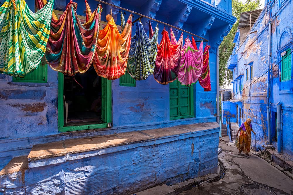 Colorful Saris Blue City by Saurabh Sirohiya — canvas wall art